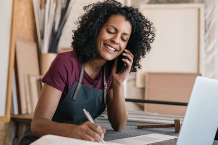 Business owner talking to TaxBoxx on the phone